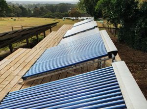 Evacuated tube solar pool heating bank